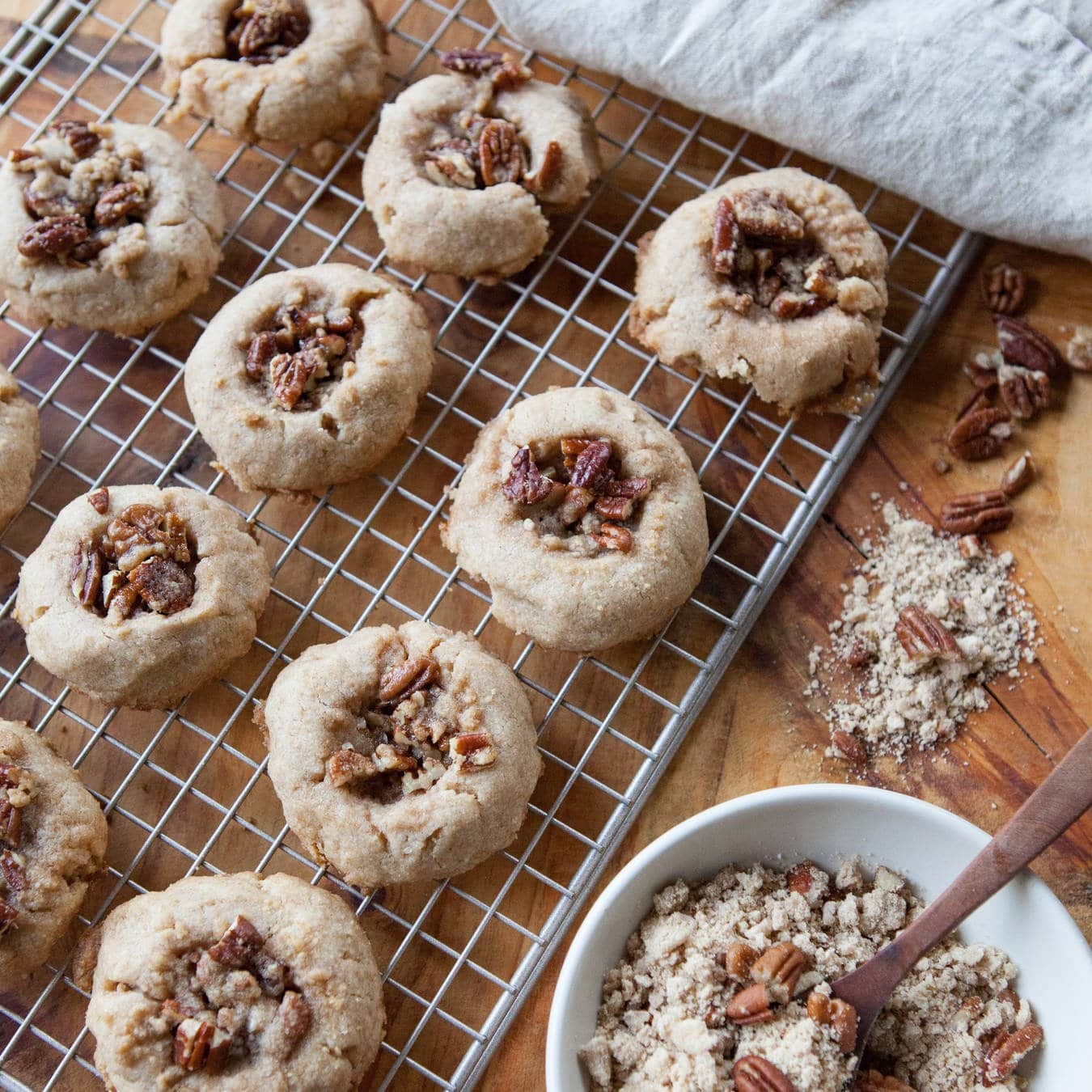 Pecan Pie Thumbprint Cookies on cooling rack.