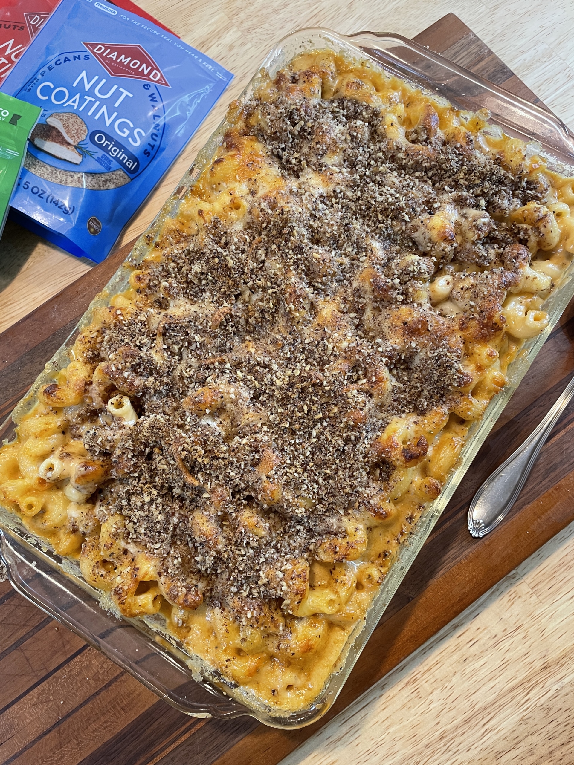 Barbecue Mac and Cheese Casserole next to bags of Diamond nut coatings.