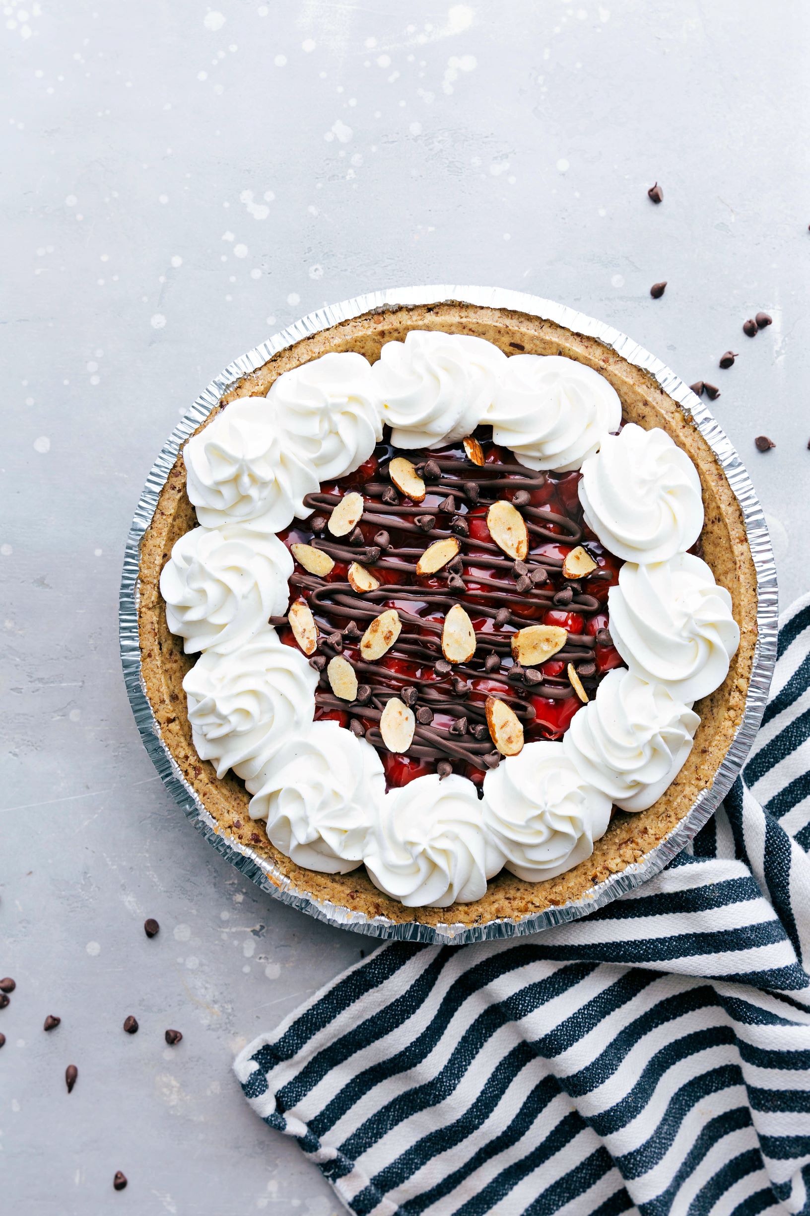 No-Bake Black Forest Cherry Pie topped with whipped cream.
