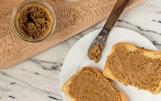 Two slices of toast spread with Honey Walnut Butter.
