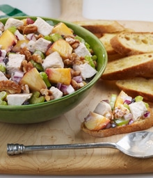 Chicken Salad with Peaches and mini toasts for serving.