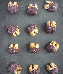 A dozen Chocolate Covered Walnuts.