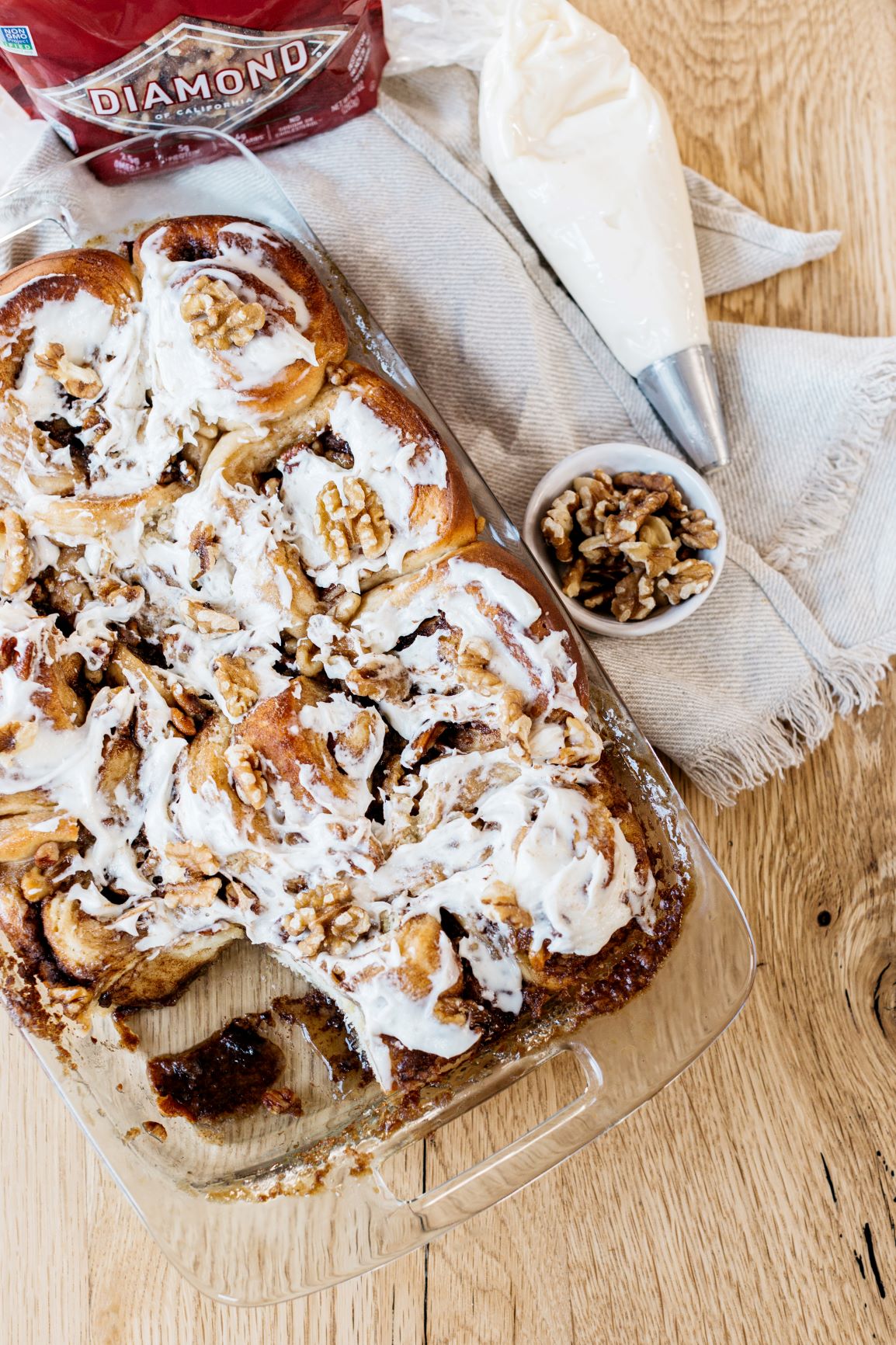 Casserole dish of Cinnamon Rolls with Pecan and Walnuts.