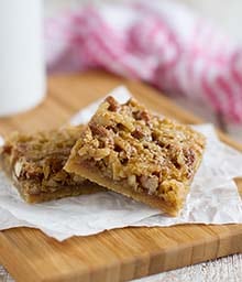Stack of two Coconut Pecan Bars.