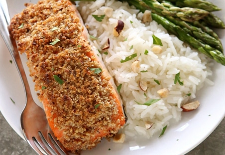 Completely Delicious Hazelnut Crusted Salmon with rice and asparagus.