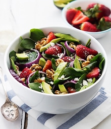 Bowl of Creme De La Crumb's Strawberry Avocado Salad.