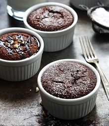 Ramekins with Creme De La Crumb's Flourless Chocolate Cakes.