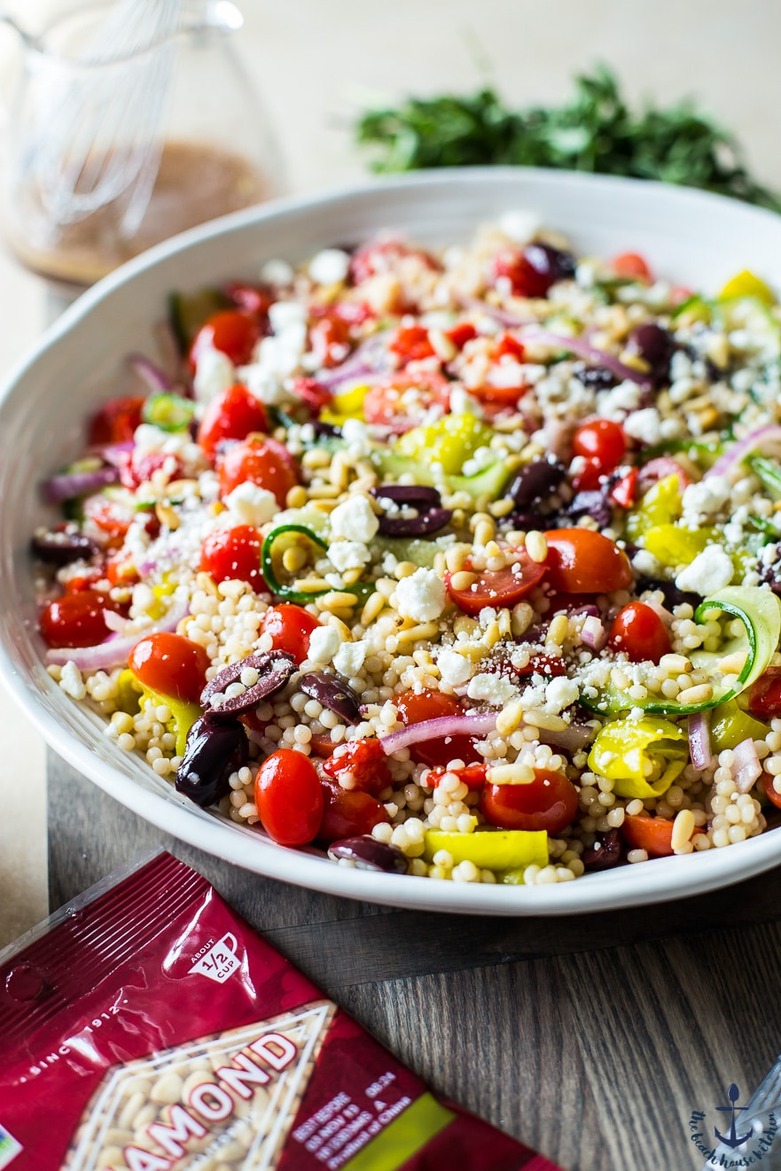 Big bowl of Greek Couscous Salad with Diamond pine nuts.