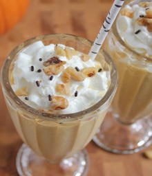 Old-fashioned glass with a Pumpkin Milkshake topped with Diamond walnuts.