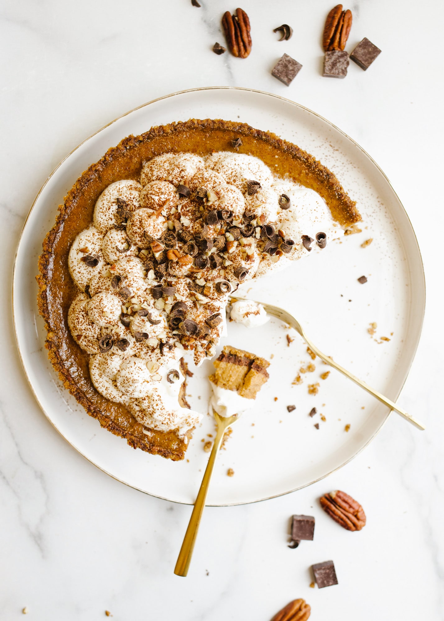 Half-eaten Chocolate Bottom Pumpkin Pie.