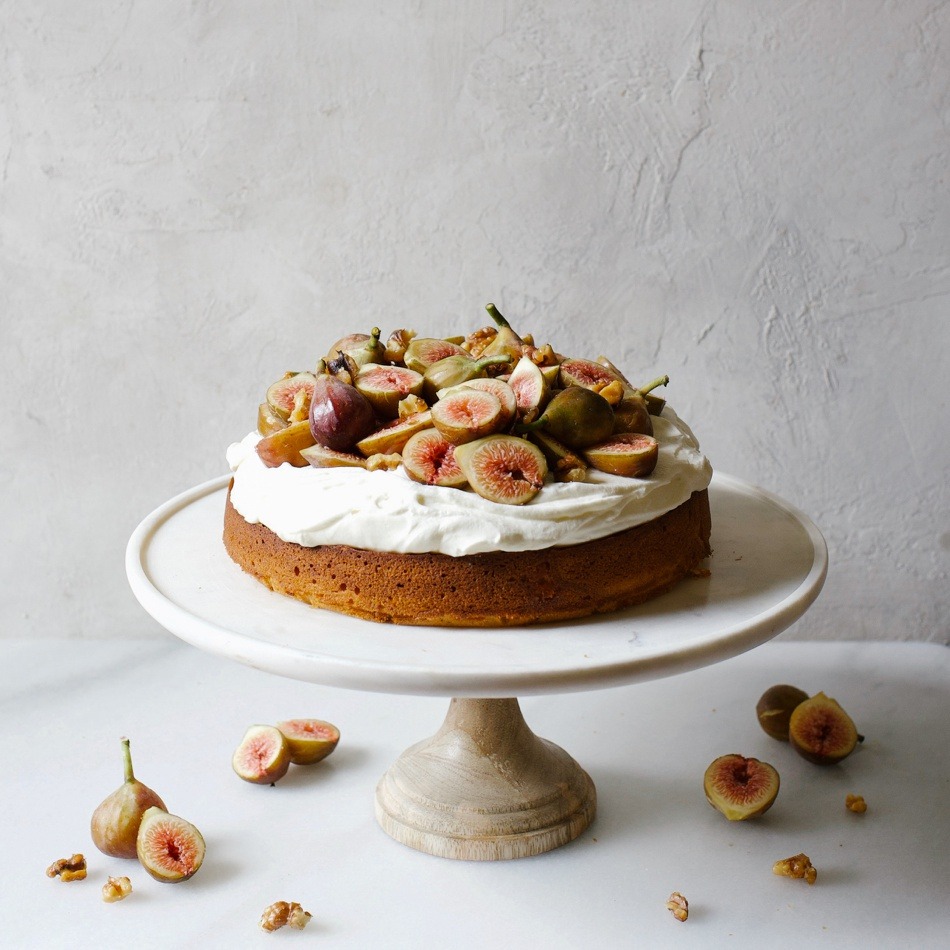 Raised display tray of Honey Cake with Figs and Whipped Cream Cheese.