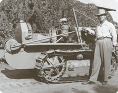 Man Standing Beside Machinery