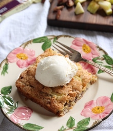 Floral plate with slice of Danish Apple Cake a la mode.