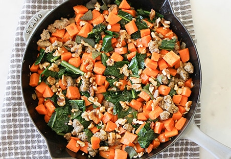 One Skillet Sweet Potatoes with Kale, Sausage and Walnuts