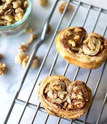 Two Walnut Palmiers on cooling rack.