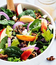 Bowl of Apple Pecan Salad with Maple Vinaigrette.