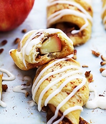 Apple Pie Roll-Ups, one cut in half.