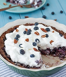 Blueberry Pecan Pie with slice removed.