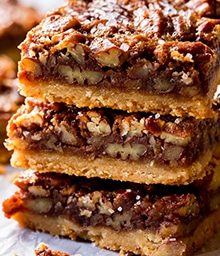 Stack of three Brown Butter Pecan Pie Bars.