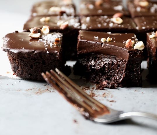 Side view of Chocolate Hazelnut Brownies with Coffee Ganache.