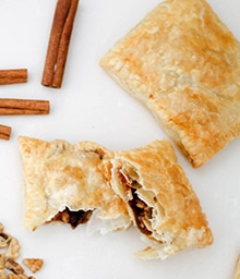 Flaky Cinnamon Walnut Breakfast Pastry cut in half.