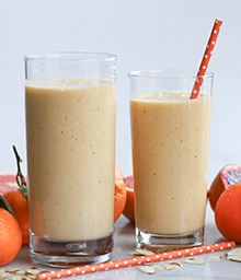 Two glasses of Orange Almond Smoothies.