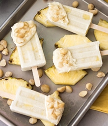 Tray of Coconut Pineapple Macadamia Popsicles.