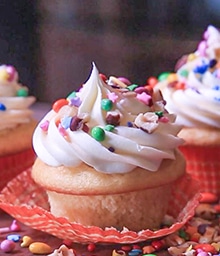 Pinata Cupcakes with colorful sprinkles.