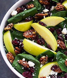 Bowl of Apple Cherry Candied Pecan Salad with Sweet Balsamic Dressing.
