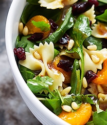Close-up on bowl of Mandarin Spinach Pasta Salad.