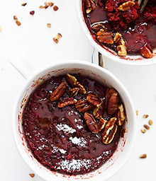 Top view of Red Velvet Mug Cake topped with Diamond nuts.