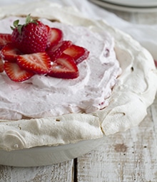 Strawberry Cream Angel Pie topped with fresh berries.