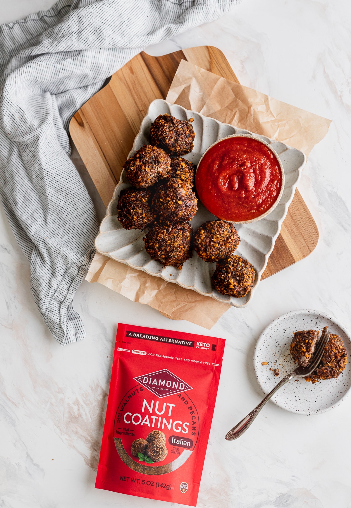 Nut-Coated Meatballs next to bag of Italian Diamond Nut Coatings.