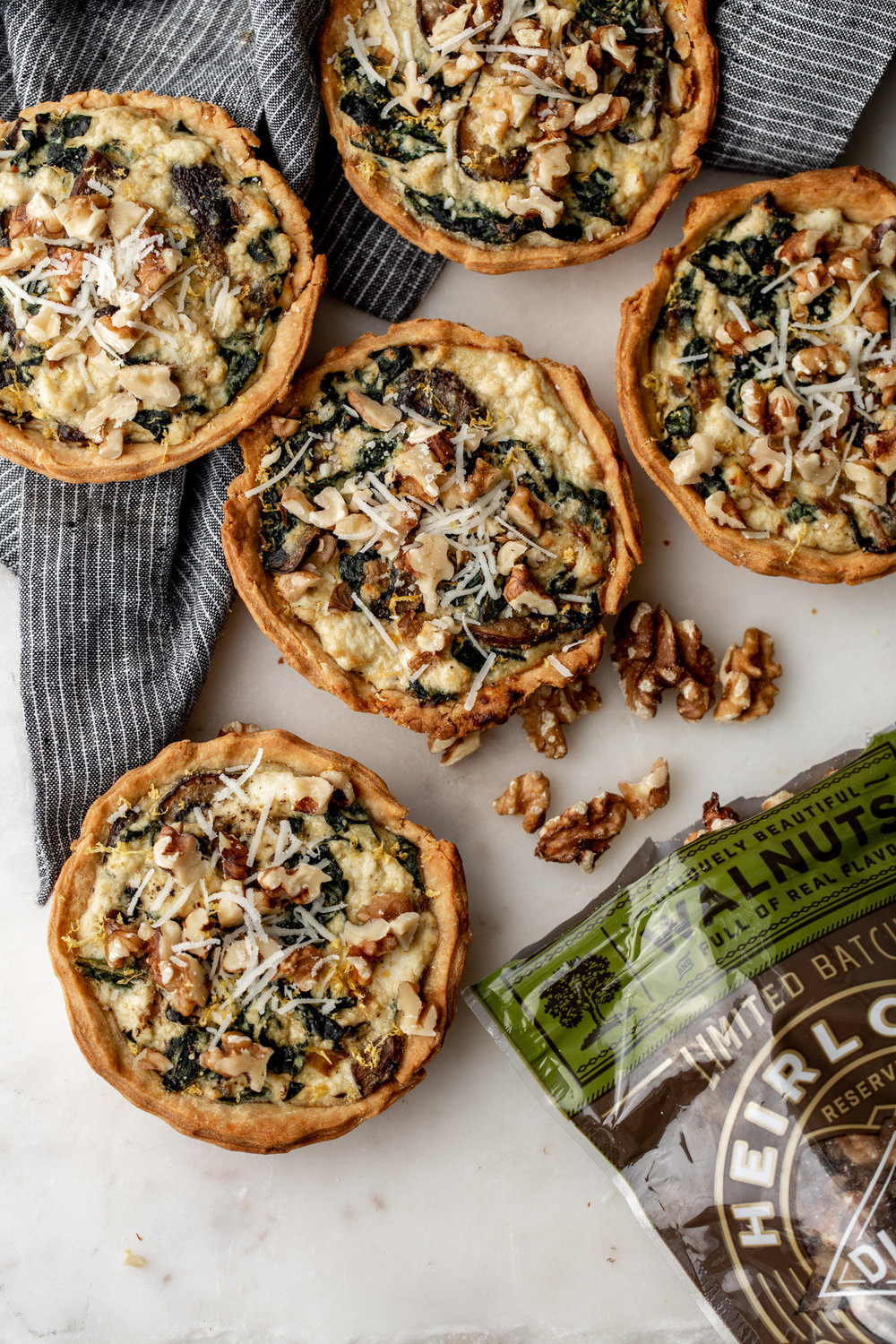 Kale and Ricotta Tarts with Walnuts and bag of Heirloom Reserve nuts.