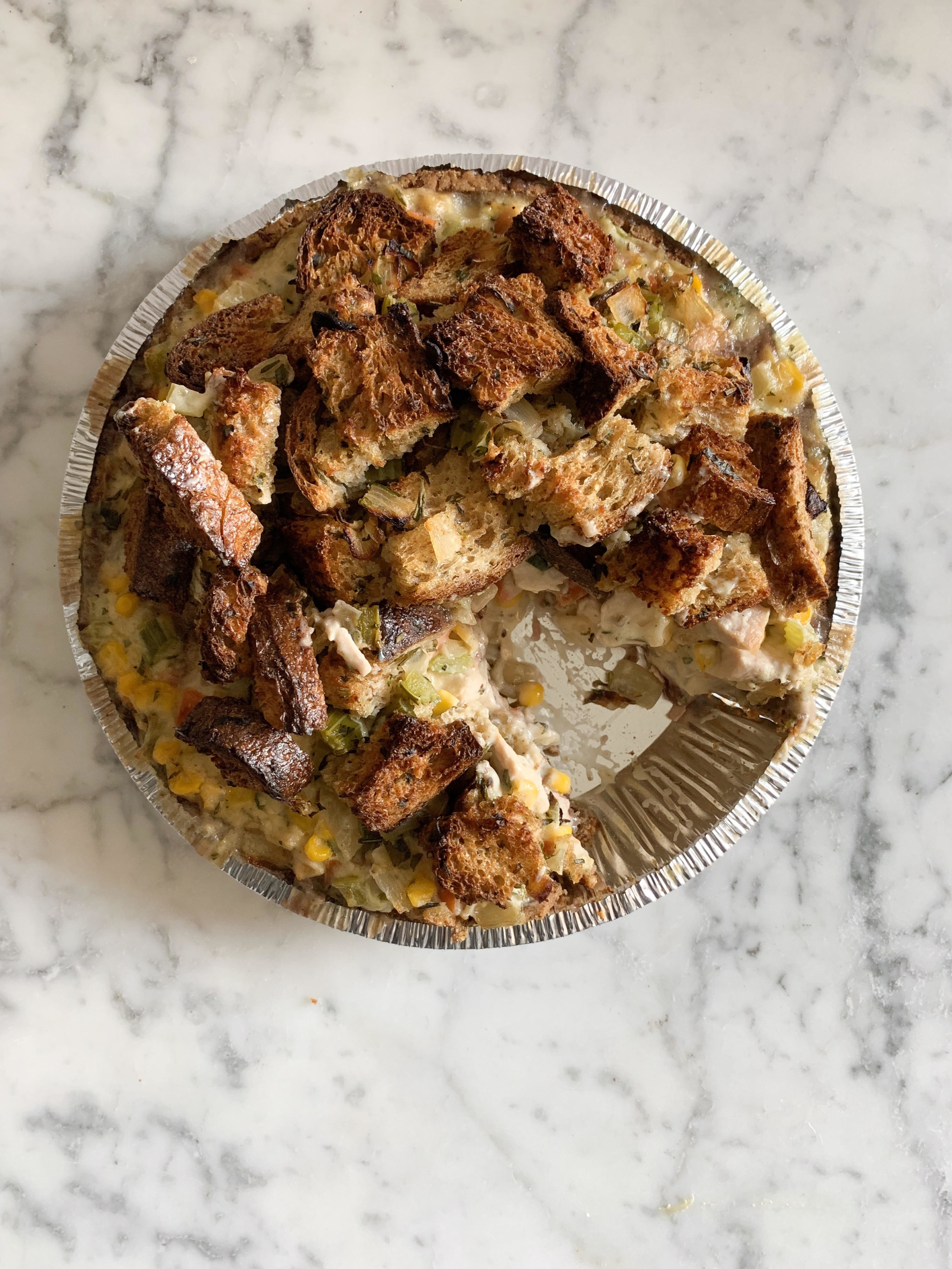 Thanksgiving Leftover Pie with Pecan Pie Crust with a slice taken out.