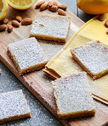 Lemon Almond Bars on cutting board.