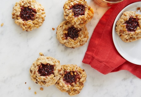 Walnut-Raspberry Linzer Thumbprint Cookies