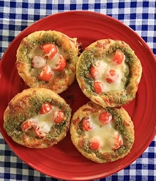 Four Mini Puff Pastry Pizzas on a plate.