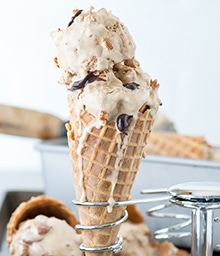 Waffle cone with two scoops of Mocha Almond Fudge Ice Cream.