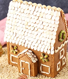 Nutty Gingerbread House with slivered almond roof and pistachio windows.