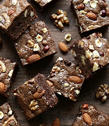 Several squares of Nutty Fudge Brownies.