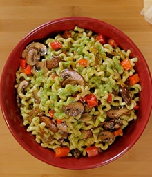 Bowl of Pesto Fusilli Pasta with Diamond walnuts.