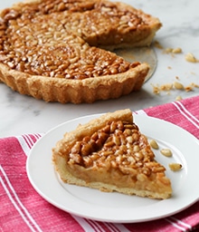 Slice of Honey Pine Nut Tart.