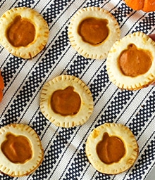 Pecan Pumpkin Pie Cookies with pumpkin design on top.