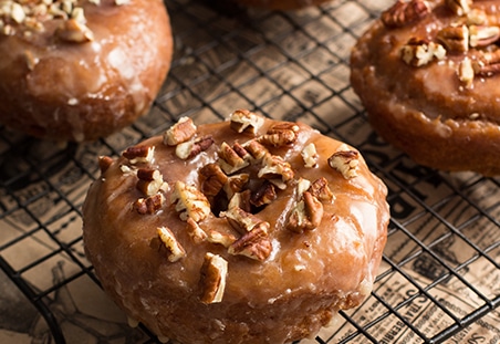 Pumpkin Spice Donuts with Maple Glaze