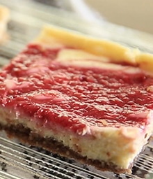 Raspberry Cheesecake Square on a cooling rack.