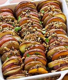 Dish of Roasted Potatoes with Brown Butter Pecan Sauce.