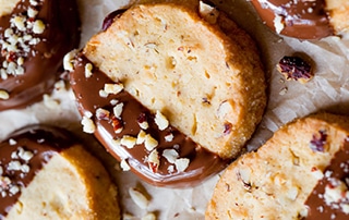 Toasted Hazelnut Slice and Bake Cookies dipped in milk chocolate.