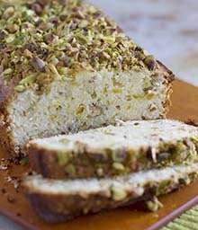Loaf and slices of Pistachio Lemon Pound Cake.