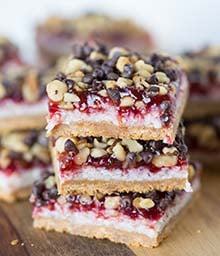 Stack of three Raspberry Coconut Bars.